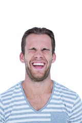 Obraz premium Happy handsome man laughing in front of camera
