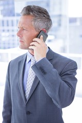 Anxious businessman on the phone 