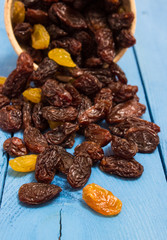 the raisins on a blue board