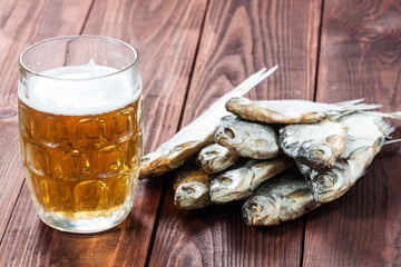 Beer glass and dried fish.