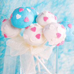 Wedding cake pops in white and soft blue.