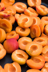 Fresh homegrown apricots halves close up