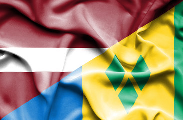 Waving flag of Saint Vincent and Grenadines and Latvia