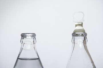 Bottle of fresh water isolated on a white background, Small glass water bottle, Bottle of water on high definition on a white background.