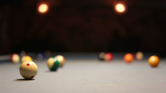 Playing pool billiards