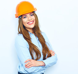Arhcitect business woman standing against white wall with cross
