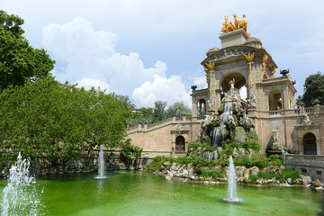 Fototapeta na wymiar Water Fountain by Antoni Gaudi in Park Guell, Barcelona, Spain