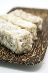 Chinese and Thai dessert of sweet taro fried on palm wood dish