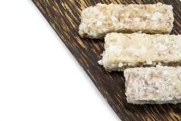 Chinese and Thai dessert of sweet taro fried on palm wood dish
