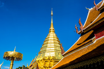 Fototapeta premium golden pagoda wat phratatdoisuthep chiangmai Thailand