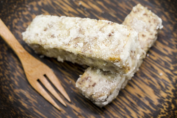 Chinese and Thai dessert of sweet taro fried on palm wood dish