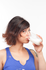 young brunette girl with a glass of milk 1