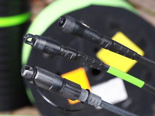 Three field hardened fibre optic connector used for outdoor fiber optic network installation in...