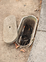 Melbourne, Australia - 2015, April 12: Typical roadside pit with Hybrid Coaxial Fiber (HFC) cable...