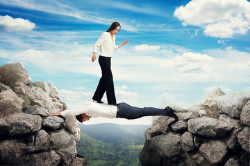 woman walking on the man