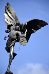 Eros statue and blue sky
