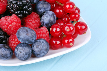 Different berries on plate