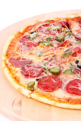 Pizza on wooden board