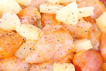 Cutted chicken breast fillet with pineapple pieces
