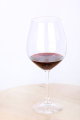 Wine in glass on wooden board