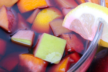 Tasty sangria in glass bowl
