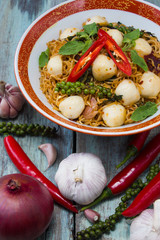 Instant noodle fried with spicy sauce and fish ball