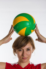 Young  sport woman with volleyball ball isolated