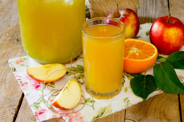 Fresh orange and apple juice drink