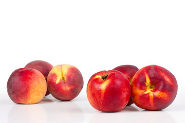 Nectarines on white table
