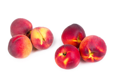 Peaches on white table