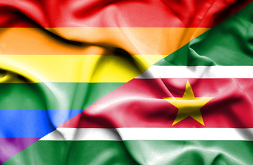 Waving flag of Suriname and Pride