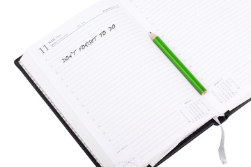 Open notebook with sign