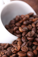 Cup in coffee beans