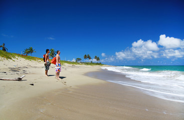 Two boys on caribbean beach