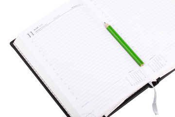 Open notebook with pencil