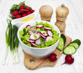 Spring salad with cucumbers and radish
