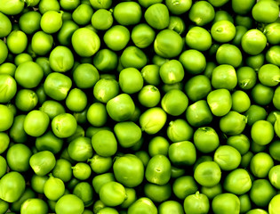 Fresh green peas macro texture background