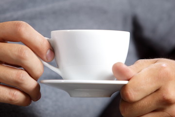 cup of coffee in the hands