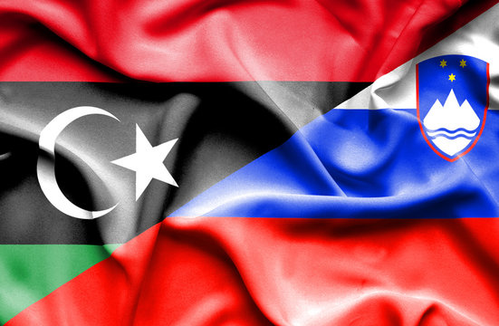 Waving flag of Slovenia and Libya