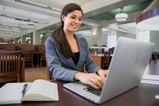 Business Woman Executive In The Library Researching Attorney Lawyer 