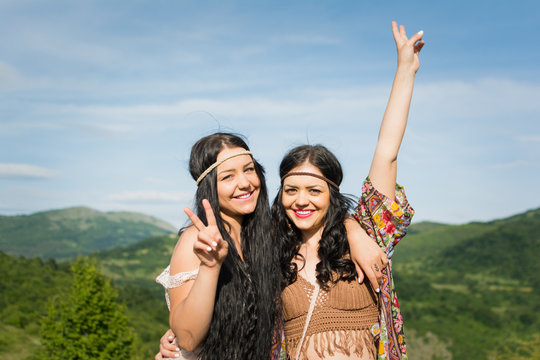Two happy and free young hippie women