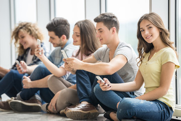 Fototapeta premium Students with gadgets