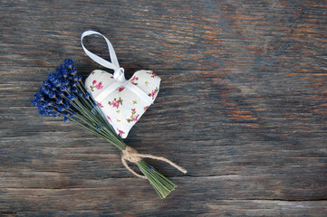 lavender flower and lavender bag on wooden table