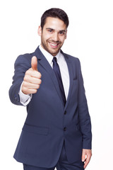 Smiling businessman with thumb up, isolated on white background