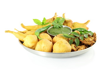 potato vada mix pakoda or fritter indian food snack in pure white background