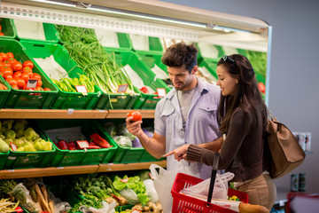 couple shopping in a supermarket