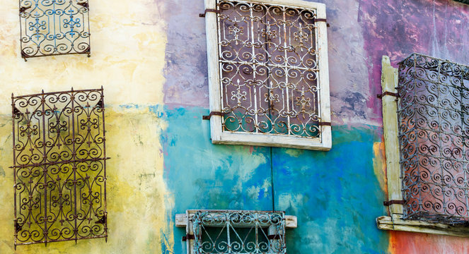 Window Grills on Colorful Wall