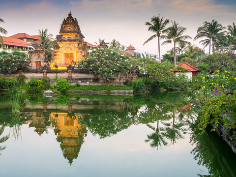 Balinese gateway, Kori Agung, pond and reflection
