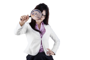 Female manager using a magnifier