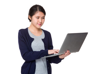 Woman using the portable computer